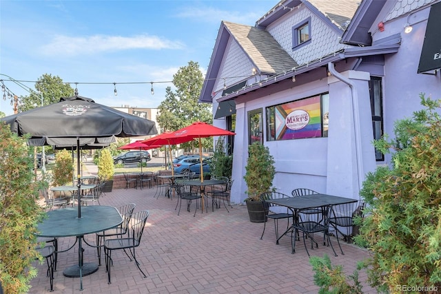 view of patio featuring outdoor dining area