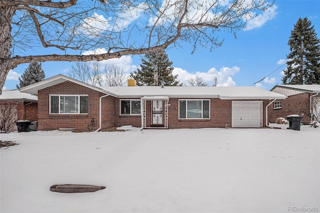 single story home featuring a garage