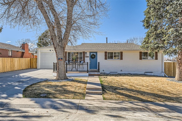 8985 Lander St, Westminster, CO 80031 - ranch-style home with concrete driveway, brick siding, an attached garage, crawl space, and a shingled roof