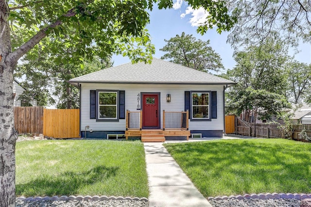 4818 Bryant St, Denver, CO 80221 - bungalow-style home with a shingled roof and a gate