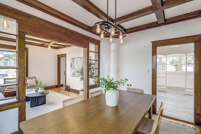 4818 Bryant St, Denver, CO 80221 - dining room featuring coffered ceiling, beamed ceiling, and a chandelier