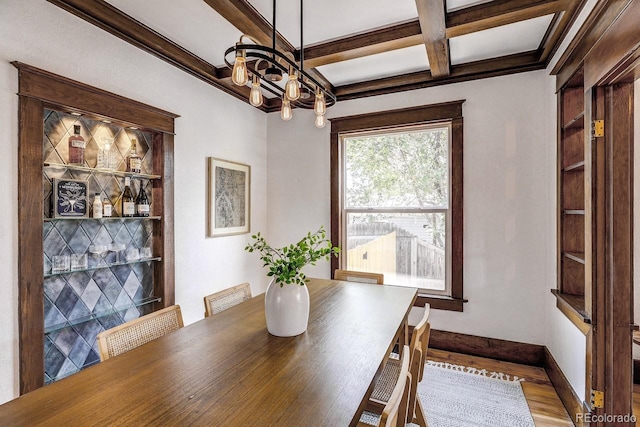 4818 Bryant St, Denver, CO 80221 - dining area featuring a chandelier, wood finished floors, coffered ceiling, and beamed ceiling