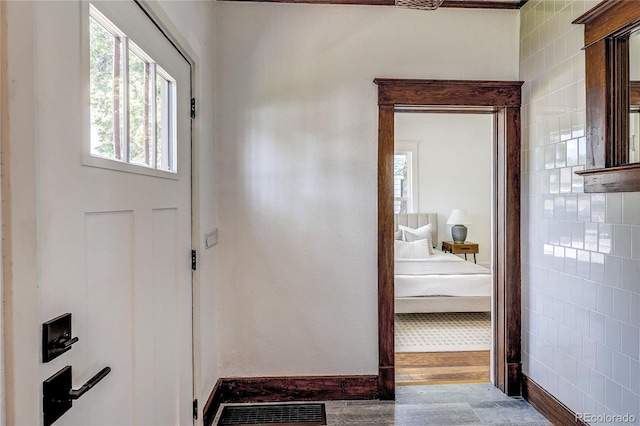 4818 Bryant St, Denver, CO 80221 - entryway with baseboards and wood finished floors
