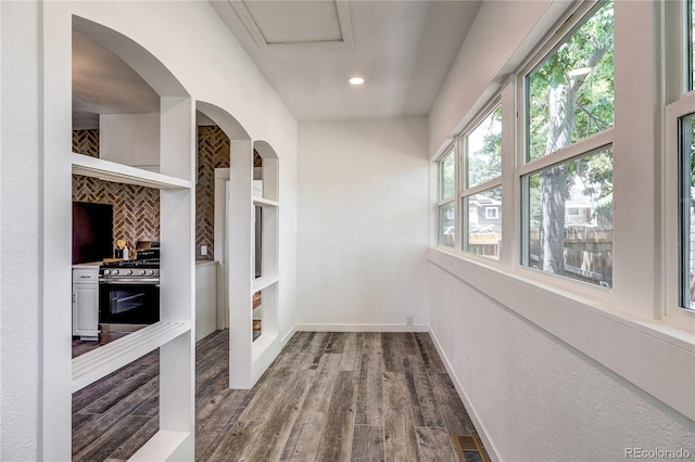 4818 Bryant St, Denver, CO 80221 - hallway featuring wood finished floors and recessed lighting