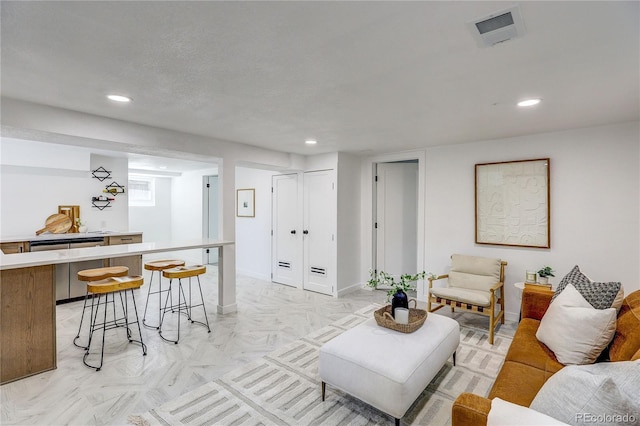 4818 Bryant St, Denver, CO 80221 - living room with recessed lighting and baseboards