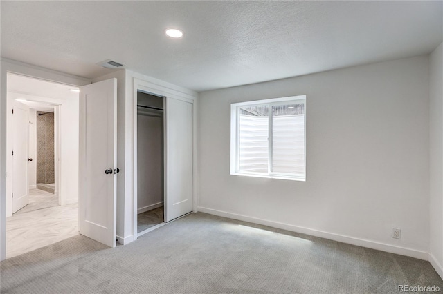 4818 Bryant St, Denver, CO 80221 - unfurnished bedroom with carpet, a closet, and recessed lighting