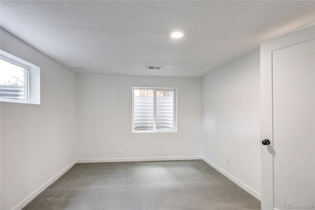 4818 Bryant St, Denver, CO 80221 - unfurnished room featuring carpet flooring, healthy amount of natural light, and recessed lighting