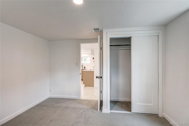 4818 Bryant St, Denver, CO 80221 - unfurnished bedroom with carpet floors and a closet