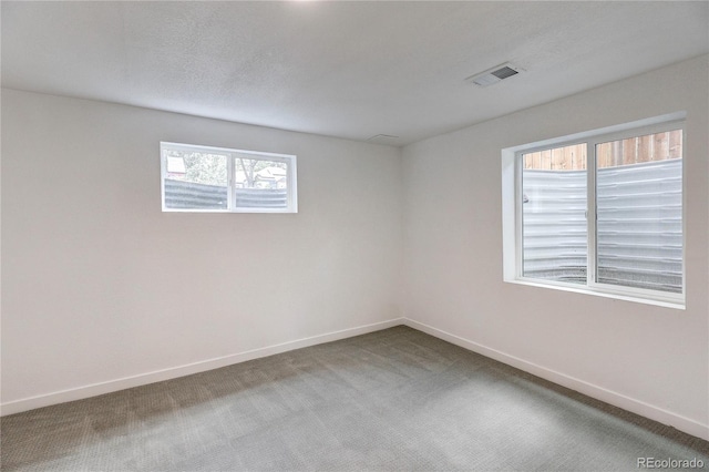 4818 Bryant St, Denver, CO 80221 - spare room with baseboards and carpet