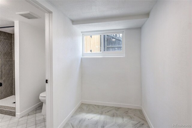 4818 Bryant St, Denver, CO 80221 - full bathroom with toilet and a stall shower