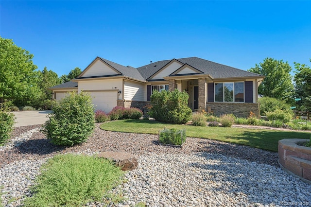 5289 Fairfield Cir, Castle Rock, CO 80104 - view of front of home with a garage, driveway, a front yard, and brick siding