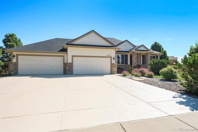 5289 Fairfield Cir, Castle Rock, CO 80104 - view of front facade featuring a garage, concrete driveway, and brick siding