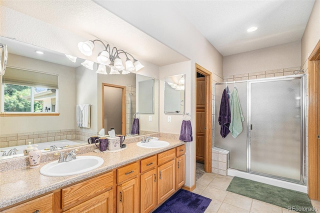 5289 Fairfield Cir, Castle Rock, CO 80104 - bathroom with tile patterned floors, a stall shower, double vanity, a bath, and recessed lighting