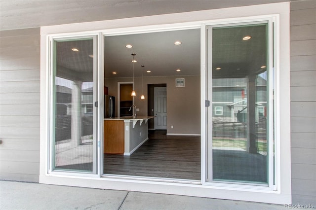 doorway to property with visible vents