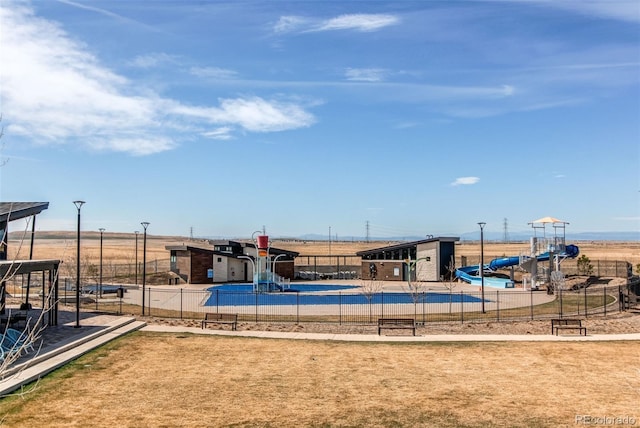 view of play area featuring fence
