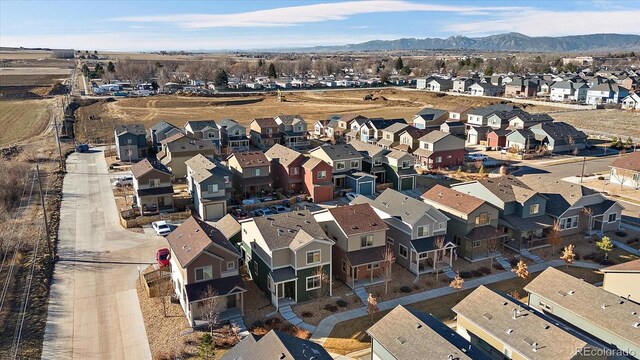 bird's eye view with a mountain view and a residential view