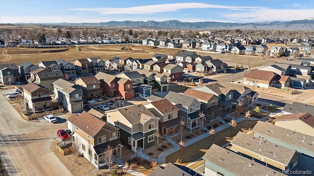 aerial view featuring a residential view and a mountain view