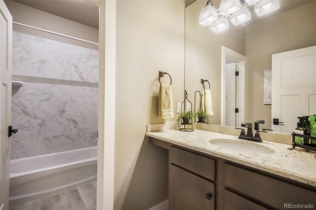 17275 Gwilym Ct, Monument, CO 80132 - bathroom with tub / shower combination and vanity