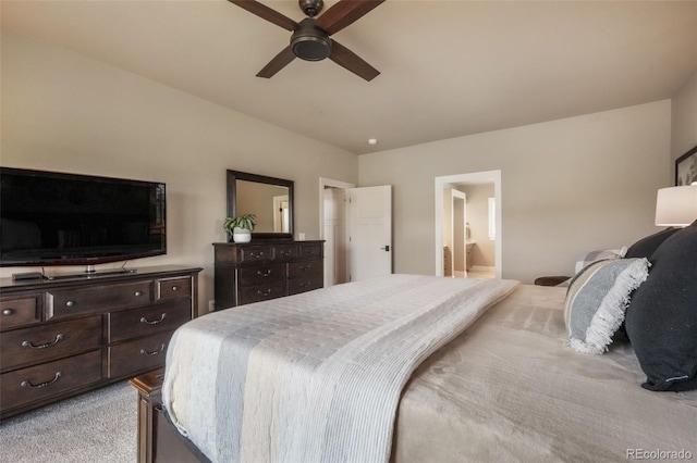 17275 Gwilym Ct, Monument, CO 80132 - bedroom with connected bathroom, light colored carpet, and a ceiling fan