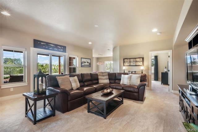 17275 Gwilym Ct, Monument, CO 80132 - living area with light colored carpet, recessed lighting, and baseboards