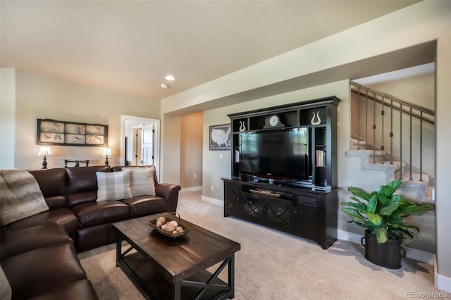 17275 Gwilym Ct, Monument, CO 80132 - living room featuring light carpet, stairway, baseboards, and recessed lighting