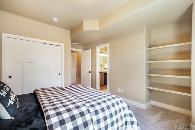 17275 Gwilym Ct, Monument, CO 80132 - bedroom with carpet, a closet, baseboards, and ensuite bath