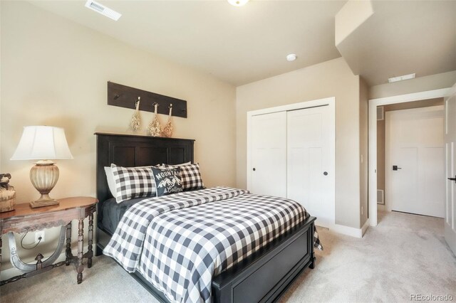 17275 Gwilym Ct, Monument, CO 80132 - bedroom with light colored carpet, a closet, and baseboards