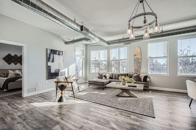 living room with wood-type flooring