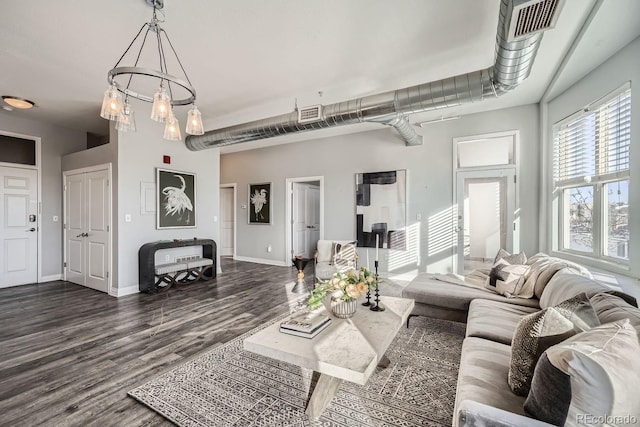 living room with dark hardwood / wood-style flooring