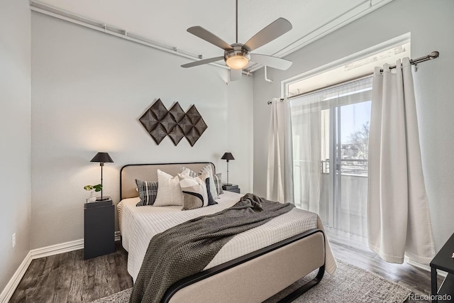 bedroom featuring wood-type flooring, access to outside, and ceiling fan