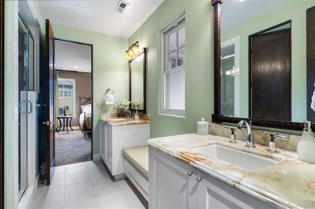 235 Eudora St, Denver, CO 80220 - full bath featuring a stall shower, vanity, and tile patterned flooring