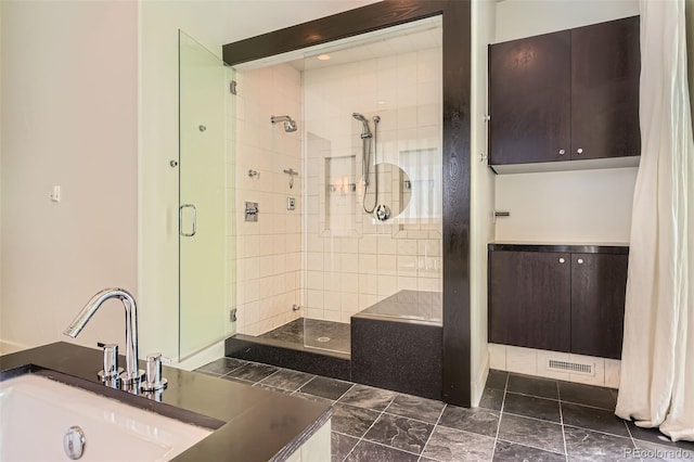 235 Eudora St, Denver, CO 80220 - bathroom with a stall shower and a sink