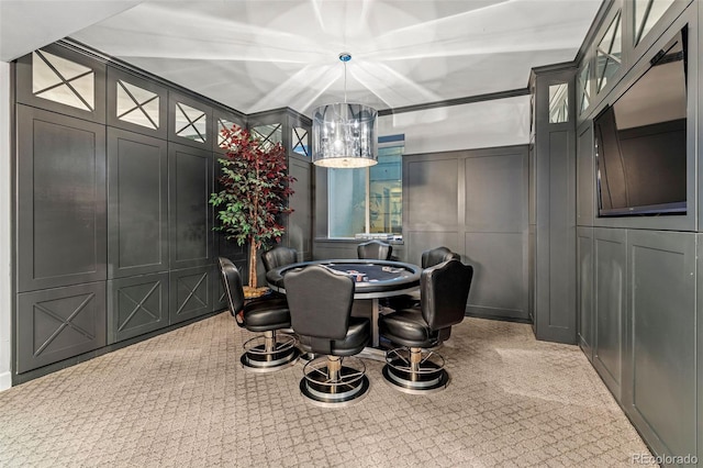 235 Eudora St, Denver, CO 80220 - carpeted dining area with a decorative wall