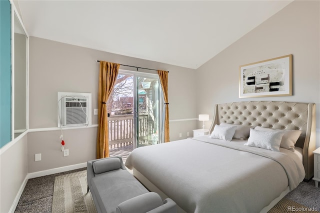 bedroom featuring lofted ceiling, access to outside, a wall mounted AC, and carpet flooring