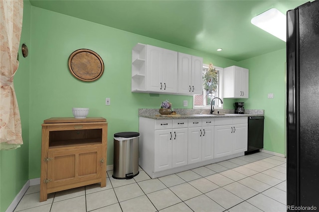 kitchen featuring open shelves, a sink, baseboards, white cabinets, and black appliances