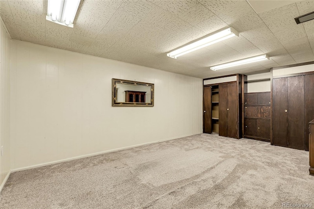 finished below grade area featuring carpet flooring