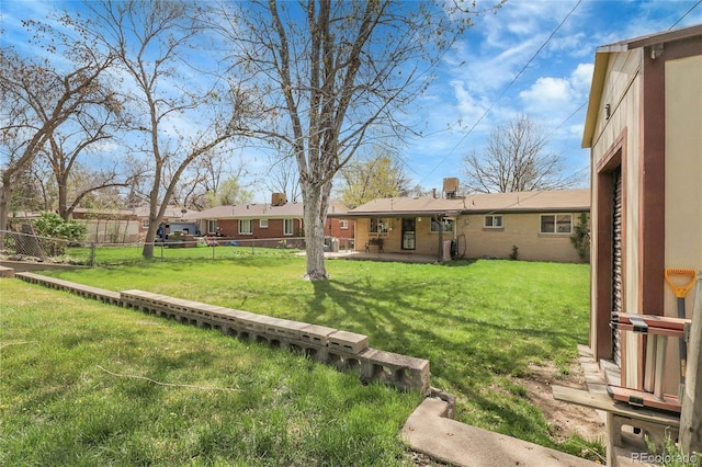 view of yard featuring fence