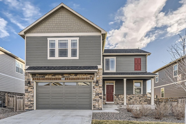 view of front of home with a garage and covered porch