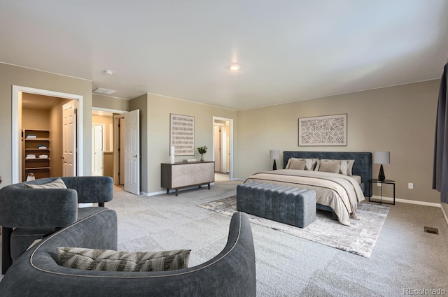 bedroom with light colored carpet