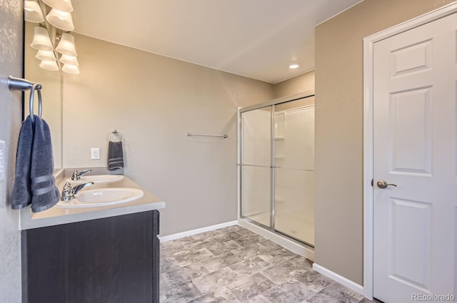 bathroom with vanity and walk in shower