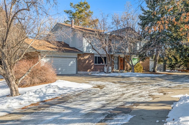 front of property with a garage