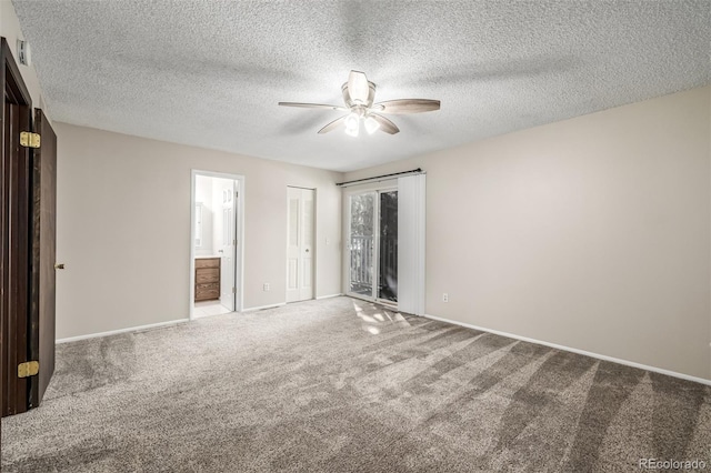 unfurnished room featuring light colored carpet, a textured ceiling, and ceiling fan