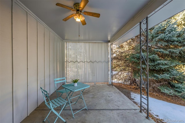 view of patio featuring ceiling fan