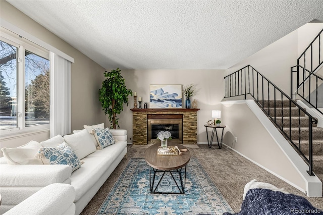 living room with carpet and a textured ceiling