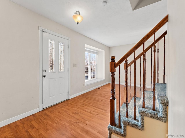 foyer featuring hardwood / wood-style flooring