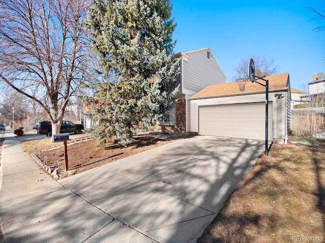 view of property exterior with a garage