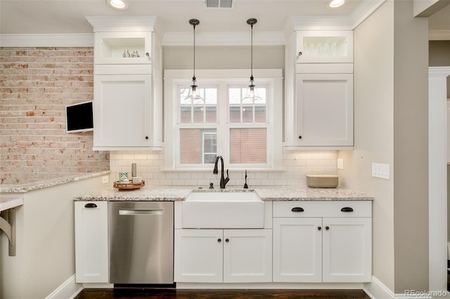 kitchen featuring visible vents, backsplash, white cabinetry, a sink, and dishwasher