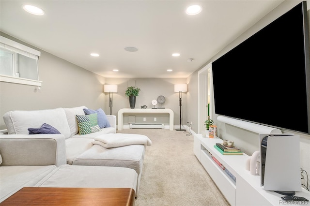 carpeted living room featuring a baseboard radiator, baseboards, and recessed lighting