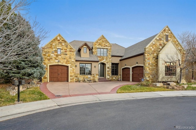 view of front of home with a garage