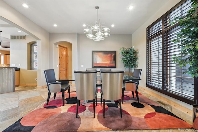 dining room with an inviting chandelier